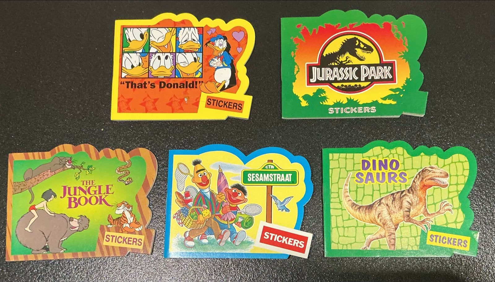 Vintage Kruidvat Stickerboekjes: Donald Duck, Jurassic Park,, Verzenden, Zo goed als nieuw, Film, Tv of Omroep