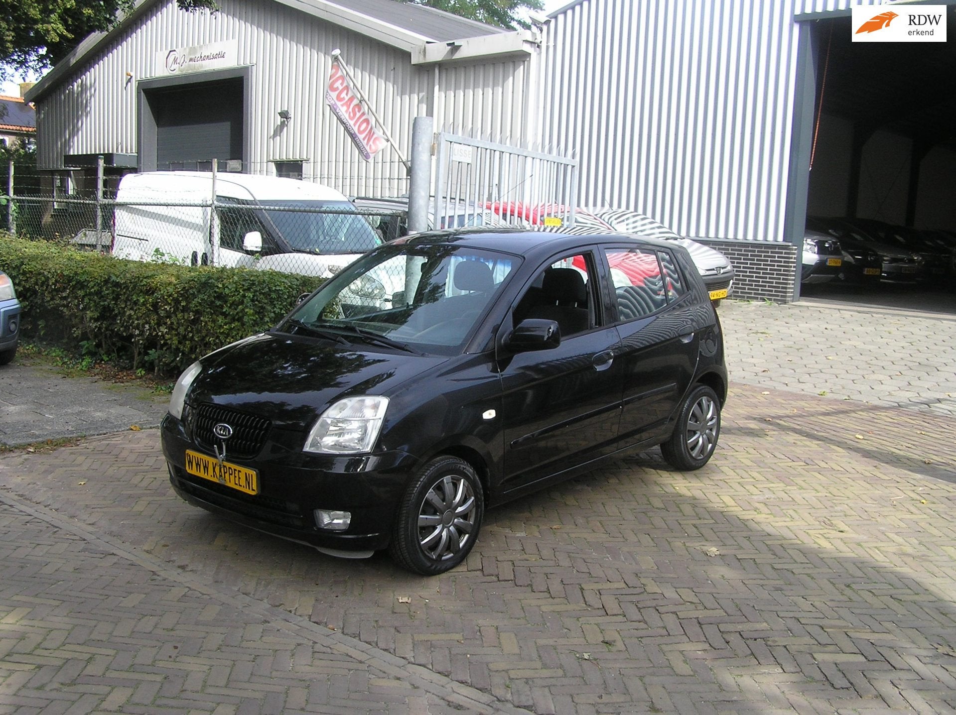 Kia Picanto 1.1 LXE 115 d km automaat APK, Stof, Gebruikt, 4 cilinders, Zwart
