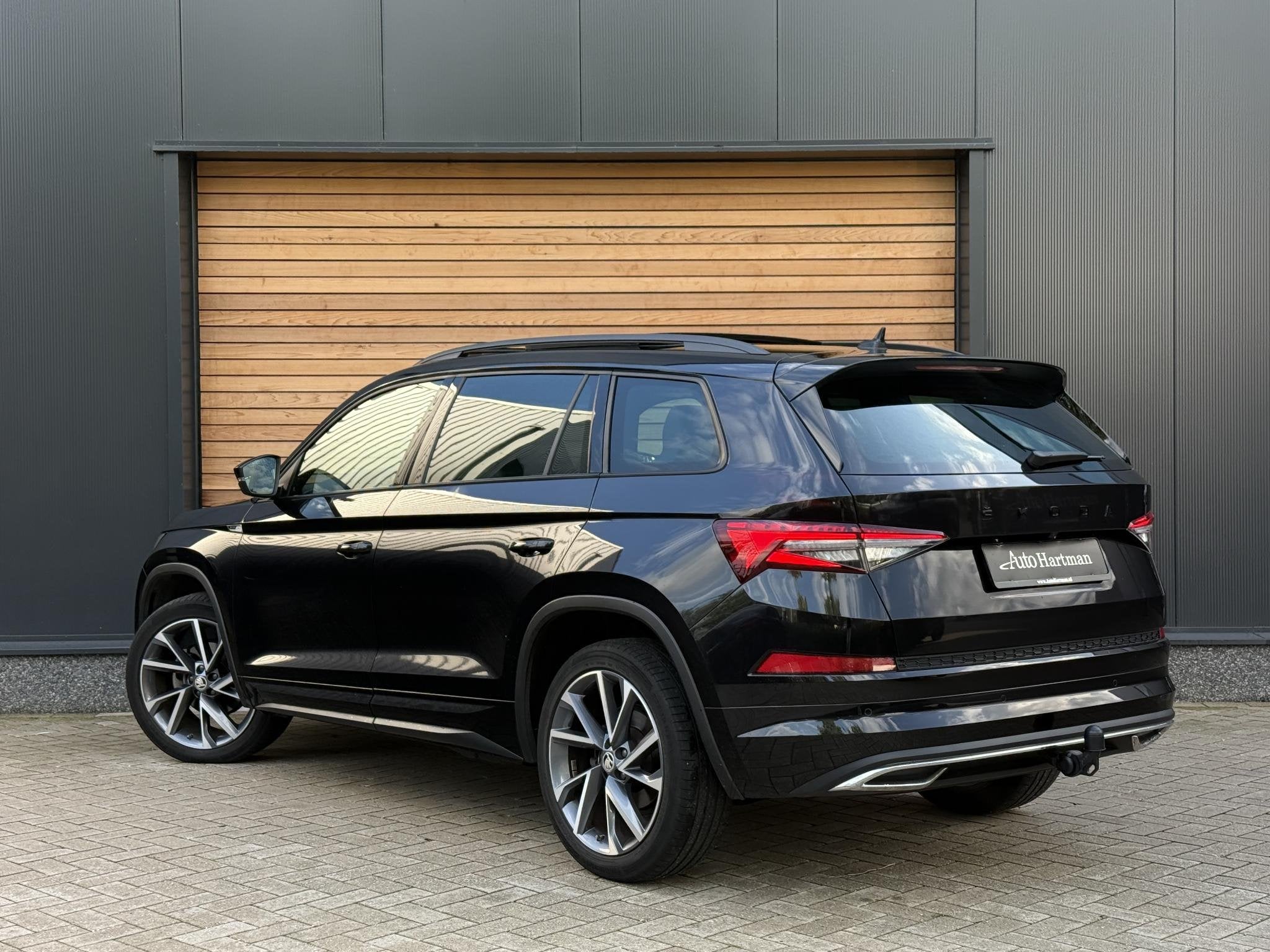 Skoda Kodiaq 1.5 TSI Sportline Business SPORTSTOELEN|TREKHAA, Auto's, Startonderbreker, 4 cilinders, 150 pk, Alcantara