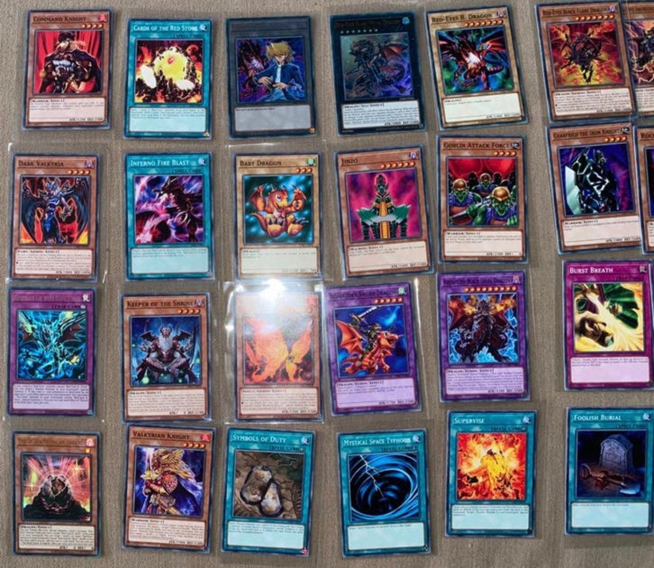 Yu-Gi-Oh! Joey Wheeler Legendary Red Eyes Black Dragon Deck, Ophalen of Verzenden, Zo goed als nieuw, Meerdere kaarten, Foil