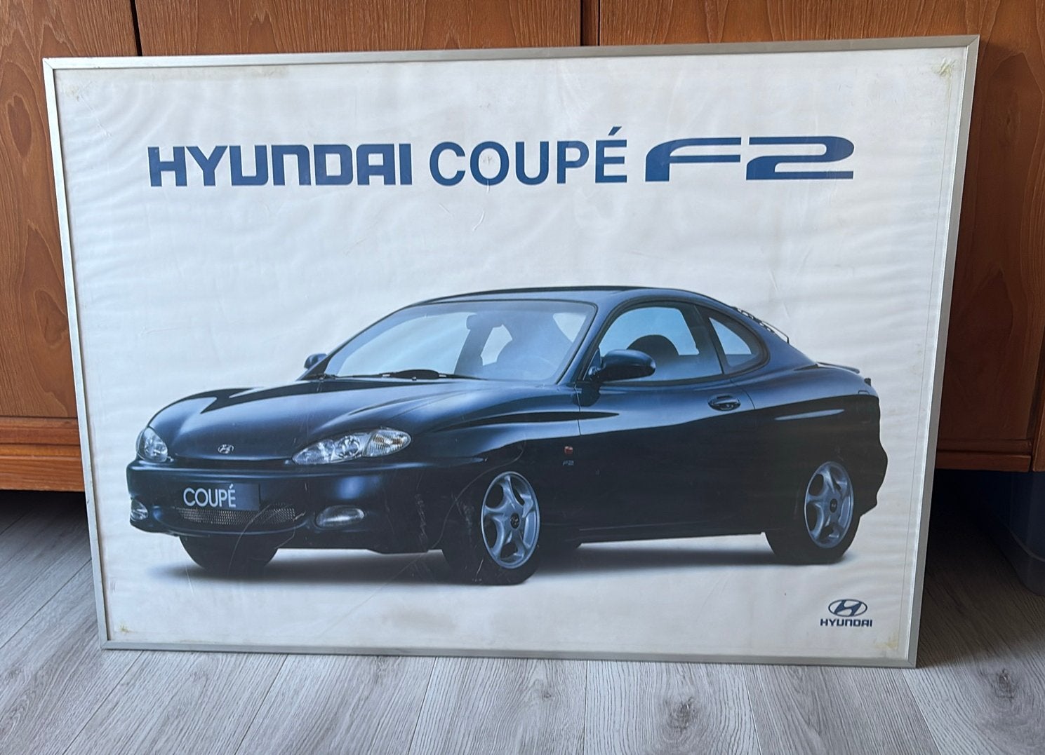 Poster Hyundai coupé f2, Ophalen, Gebruikt, Met lijst, Deurposter of groter