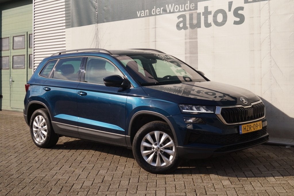 Skoda Karoq 2.0 TDI DSG Ambition -LEER-NAVI-ECC-PDC-, Auto's, Skoda, Automaat, Gebruikt, 4 cilinders, Blauw