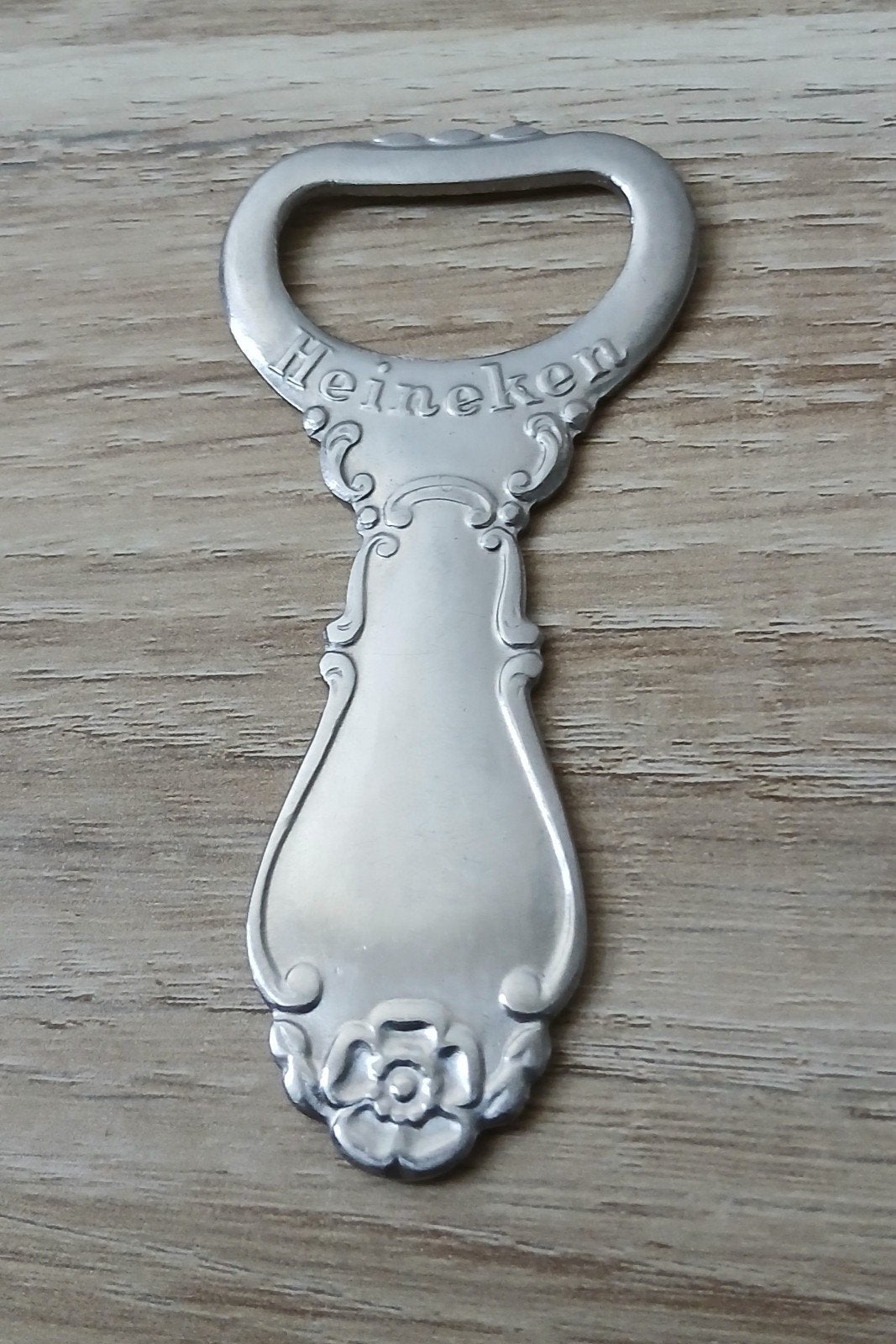Vintage Heineken Flesopener Verzilverd Sola 1930, Ophalen of Verzenden, Zo goed als nieuw, Reclamebord, Plaat of Schild, Heineken