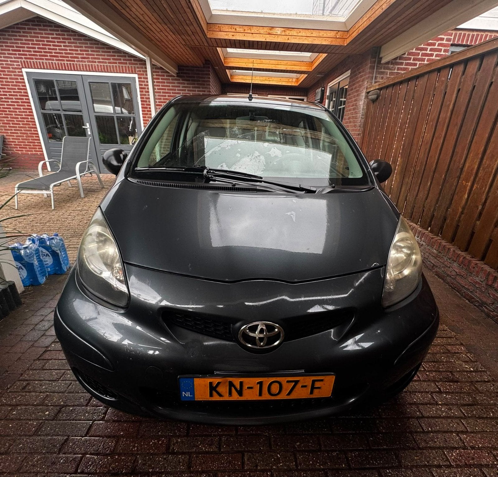 Toyota Aygo 1.0 12V Vvt-i 3DRS MMT 2011 Grijs, Auto's, Toyota, Voorwielaandrijving, 4 stoelen, 68 pk, Handgeschakeld