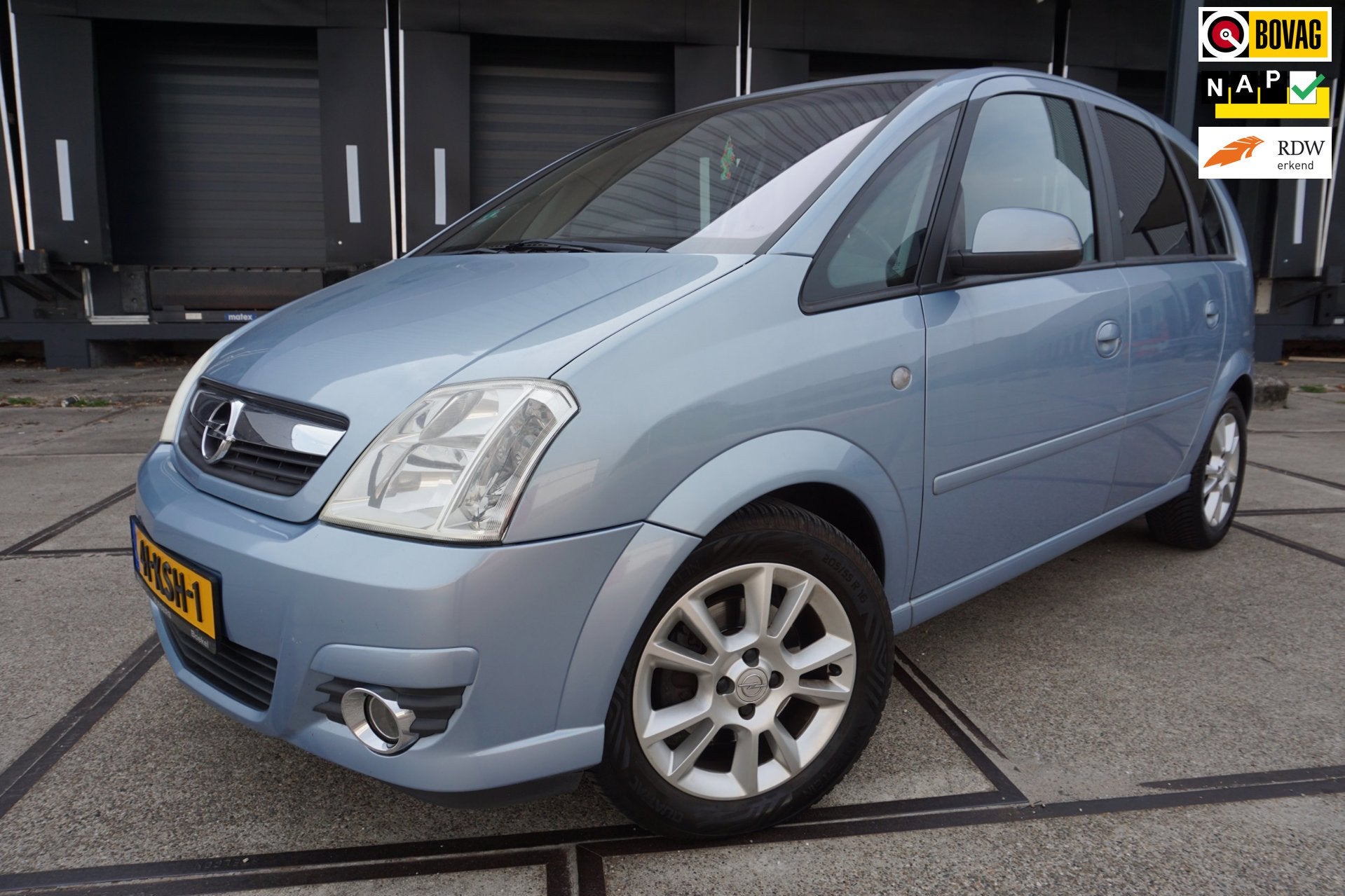 Opel Meriva 1.6-16V Cosmo, Auto's, Gebruikt, Zwart, 4 cilinders, Parkeersensor