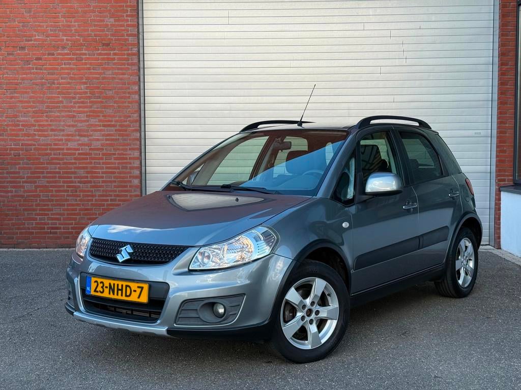 Suzuki SX4 1.6 Exclusive | NAP | AIRCO | TREKHAAK |, Voorwielaandrijving, Euro 5, Stof, Zwart