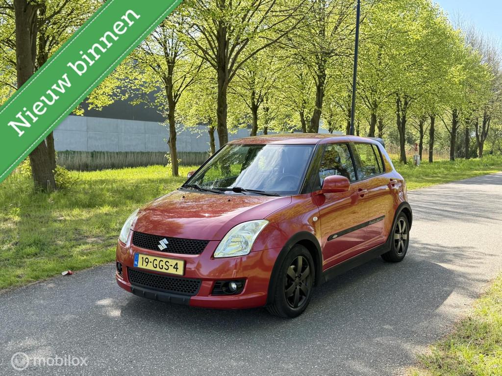 Suzuki Swift 1.3 Shogun*NEW APK 4/27*LEDER*AIRCO*ELEK. RAMEN, Auto's, Voorwielaandrijving, Zwart, 400 kg, Swift