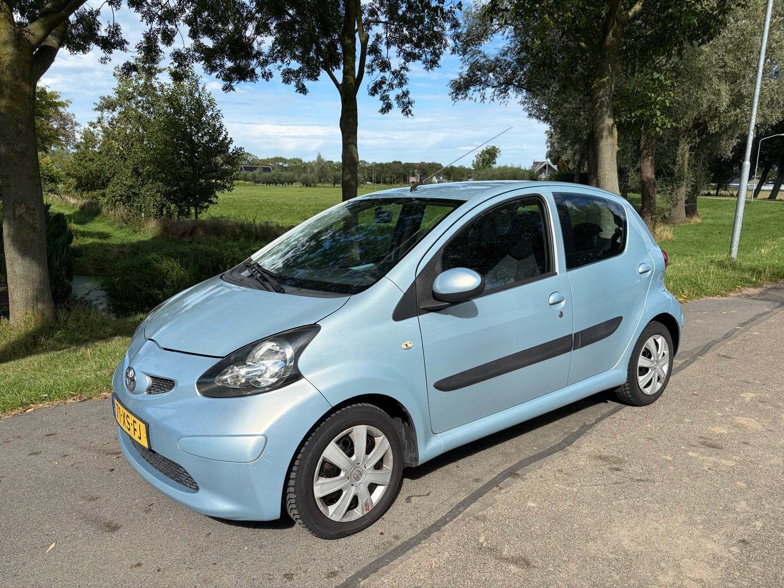 Toyota Aygo 1.0 12V Vvt-i 5DRS 2007 Blauw, Auto's, Voorwielaandrijving, Stof, Zwart, 68 pk