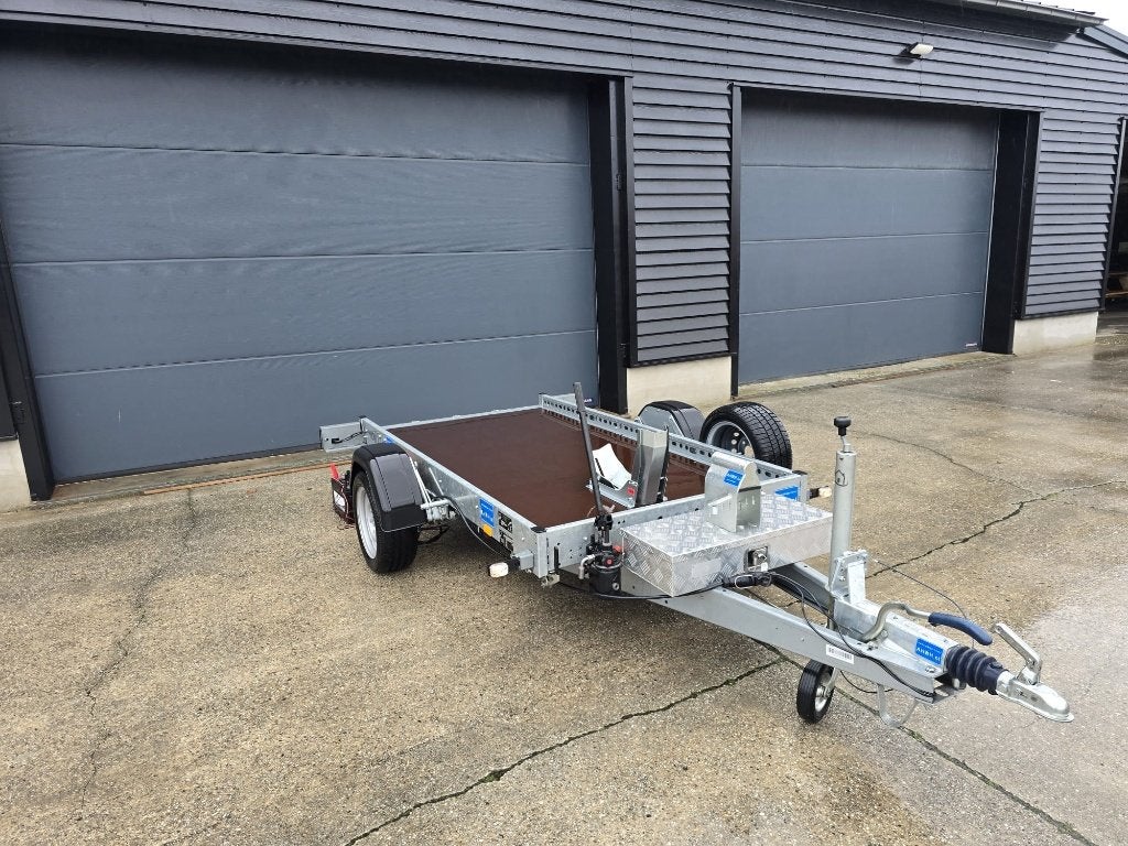 Afzinkbare motoraanhangwagen, Ophalen, Nieuw