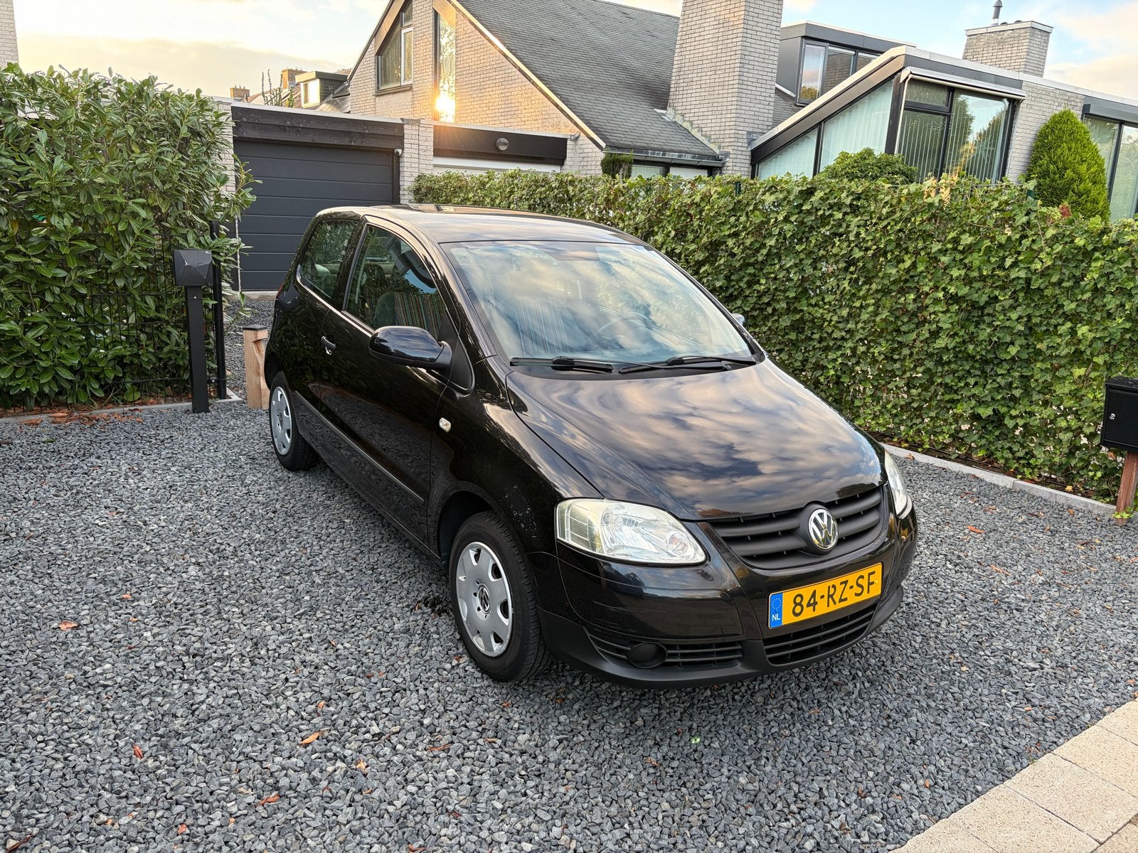 Volkswagen Fox 1.2 40KW 2005 Zwart 77K km, Auto's, Voorwielaandrijving, Stof, 4 stoelen, 1198 cc