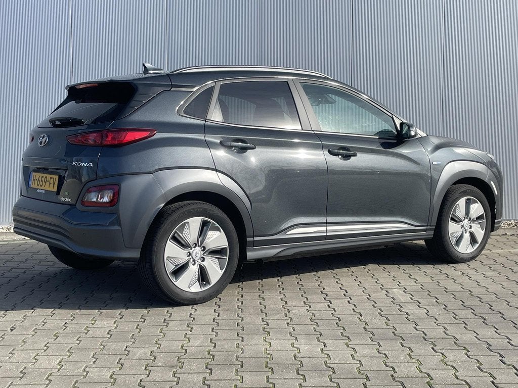 Hyundai Kona EV Fashion 64 kWh / 3 Fase Lader / Cruise Contr, Auto's, Hyundai, Stof, Gebruikt, Origineel Nederlands, Automatische klimaatregeling