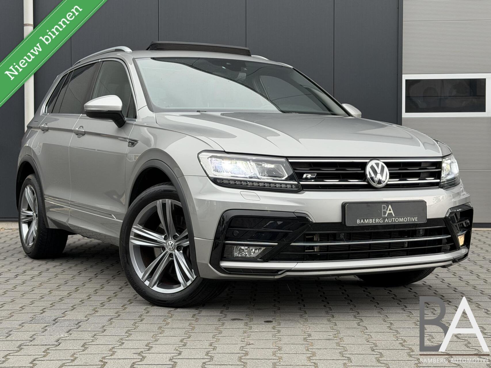 Volkswagen Tiguan 2.0 TSI 4Motion R-line|pano|trekhaak|leder, Auto's, Gebruikt, 4 cilinders, 2500 kg, Leder