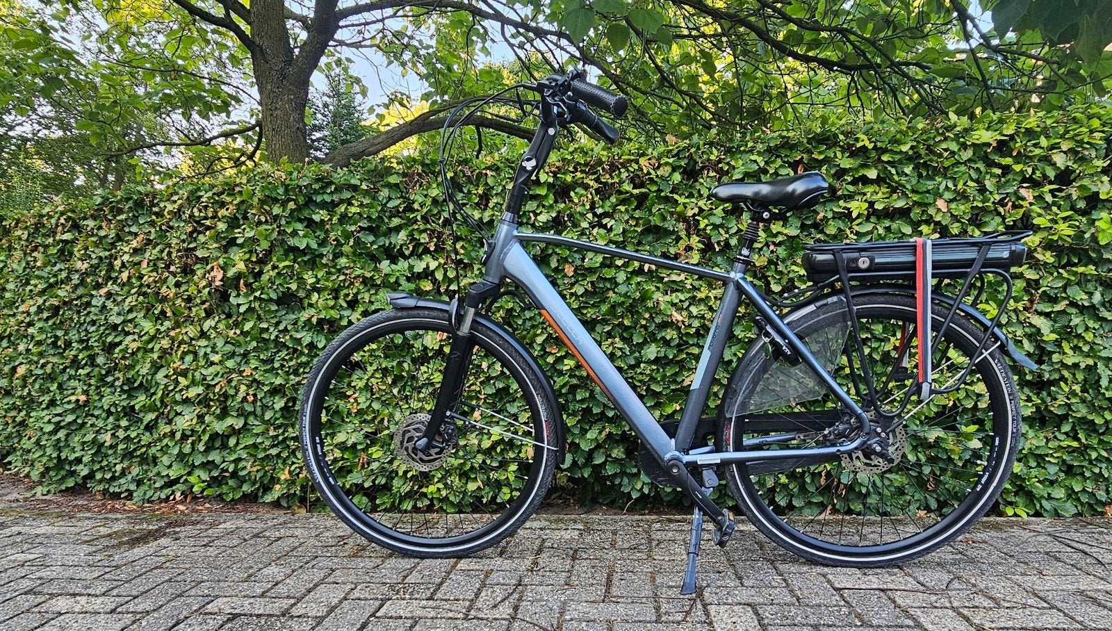 Elektrische Stella herenfiets, Fietsen en Brommers, Gebruikt, 51 tot 55 cm, 50 km per accu of meer, Ophalen