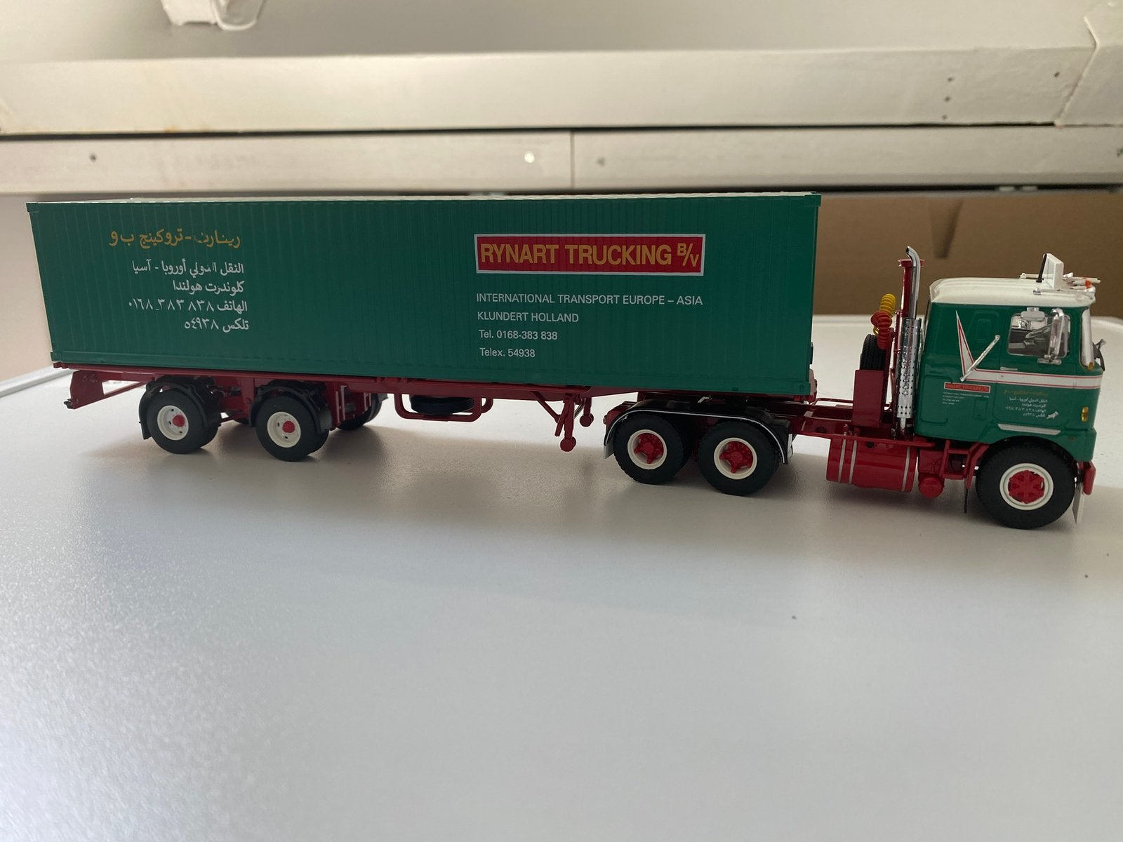 Mack F700 + containeroplegger - Rynart Trucking, Hobby en Vrije tijd, Modelauto's | 1:50, Ophalen of Verzenden, Zo goed als nieuw