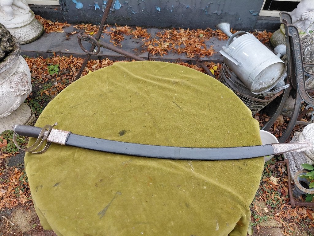Antieke sabel in zwarte schede, herkomst India., Ophalen of Verzenden