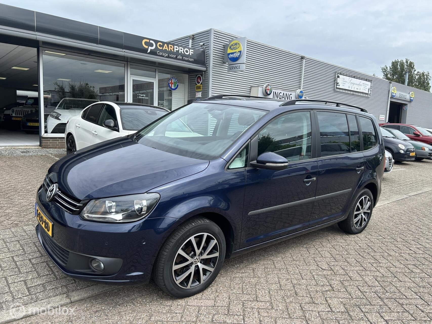 Volkswagen Touran 1.4 TSI Highl. 7p Automaat Pano, Euro 5, 15 km/l, Gebruikt, 4 cilinders