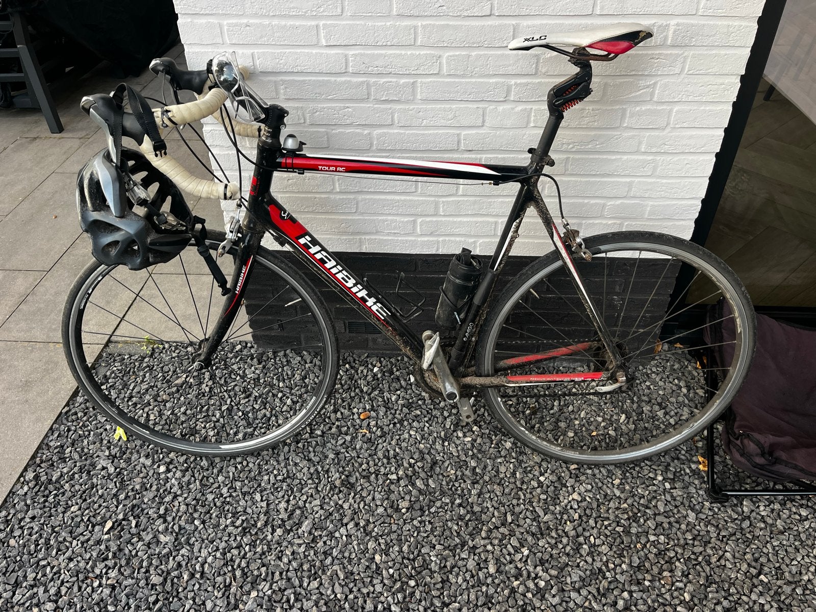 Haibike racefiets met vering, helm en schoenen maar 46