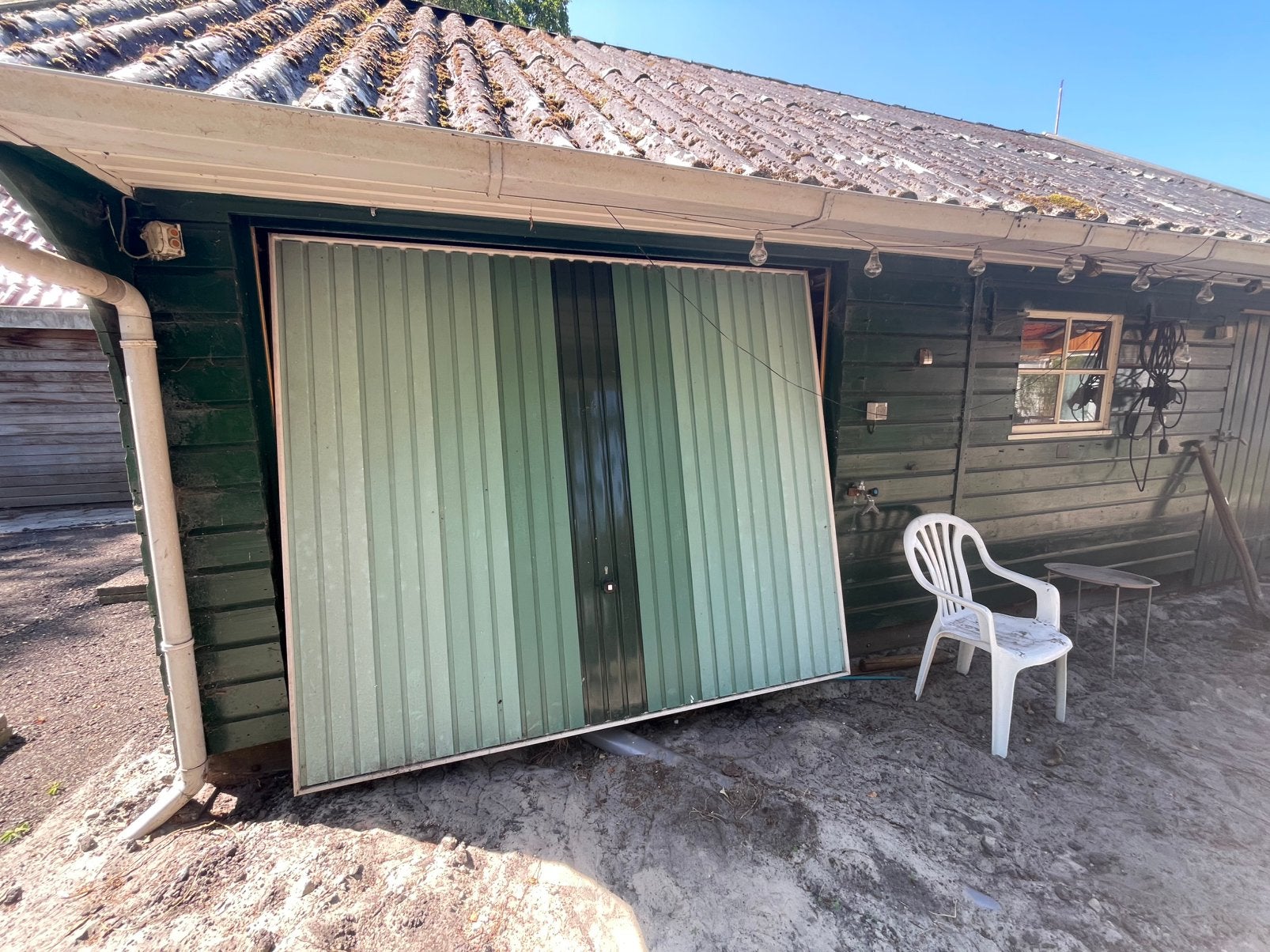 Complete garagedeur in een prima staat, Ophalen