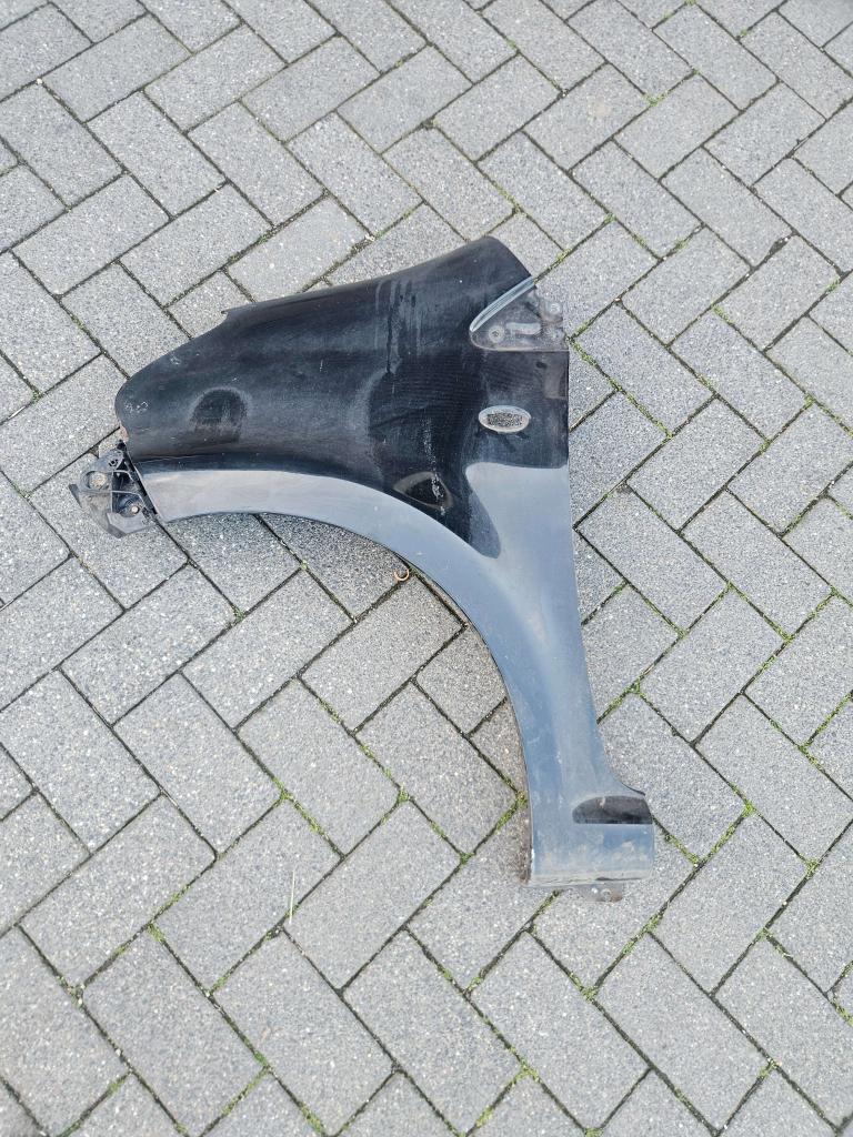ZIJSCHERM LINKS VOOR TOYOTA AYGO, Auto-onderdelen, Carrosserie en Plaatwerk, Niet ingevuld, Gebruikt, Ophalen of Verzenden, Spatbord