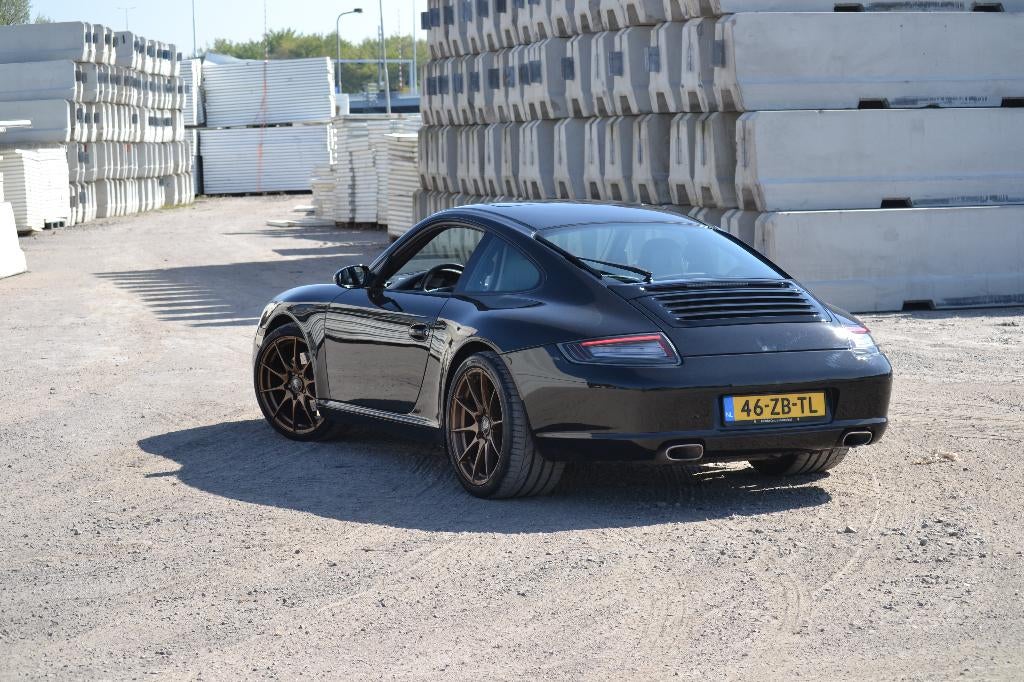 Porsche 911 3.6 Carrera Coupe 2006 Zwart, Achterwielaandrijving, 1370 kg, 4 stoelen, Zwart