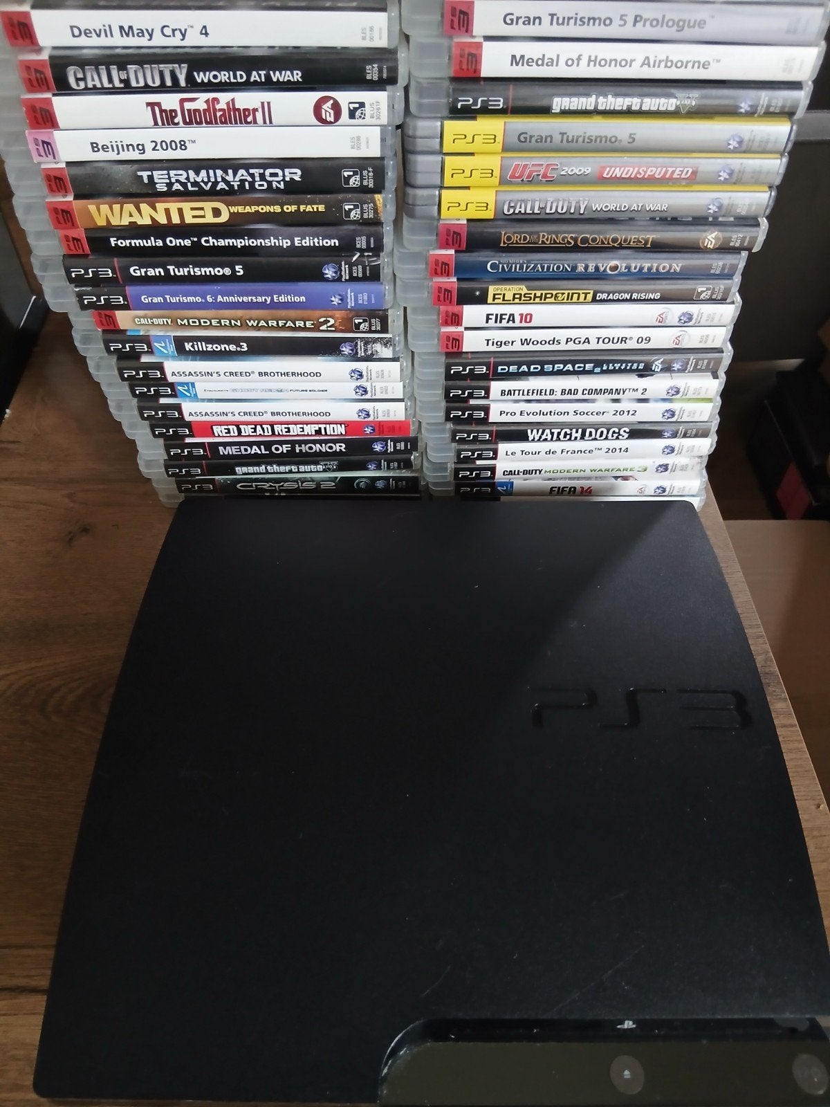 PlayStation 3 met 2 controllers en 38 games, Spelcomputers en Games, Gebruikt, Vanaf 18 jaar, 2 spelers, Eén computer