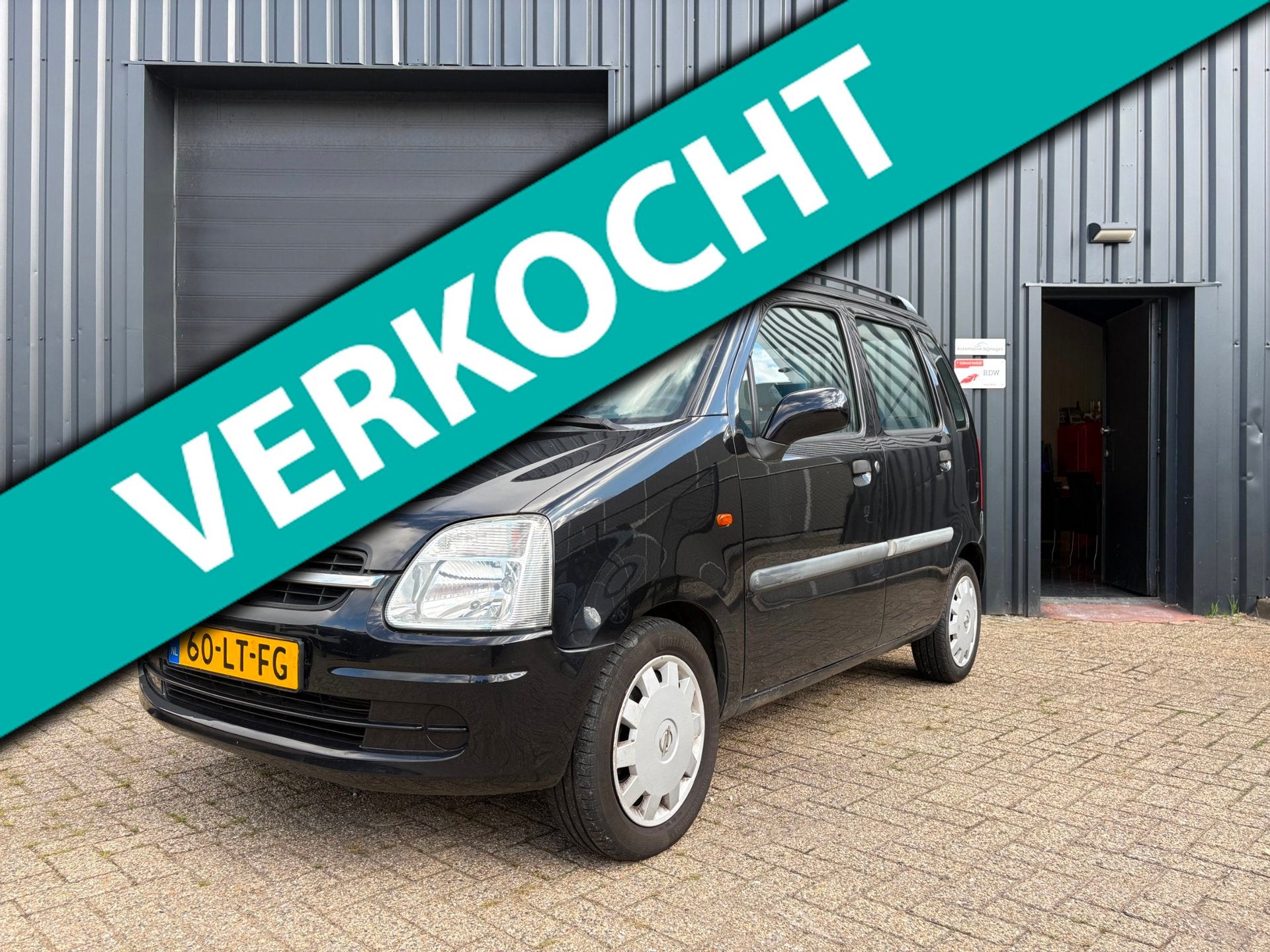 Opel Agila 1.2-16V Color Edition-NWE APK-Airco-ORG NL, Auto's, Voorwielaandrijving, Stof, Zwart, Origineel Nederlands