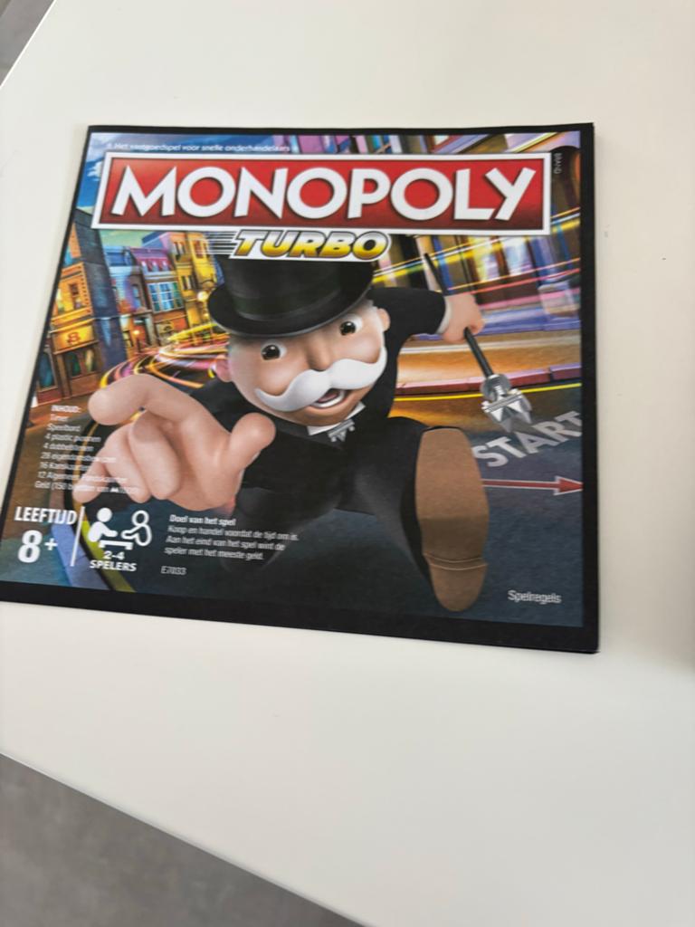 Monopoly Turbo - Het snelle vastgoedspel, Drie of vier spelers, Ophalen of Verzenden, Zo goed als nieuw