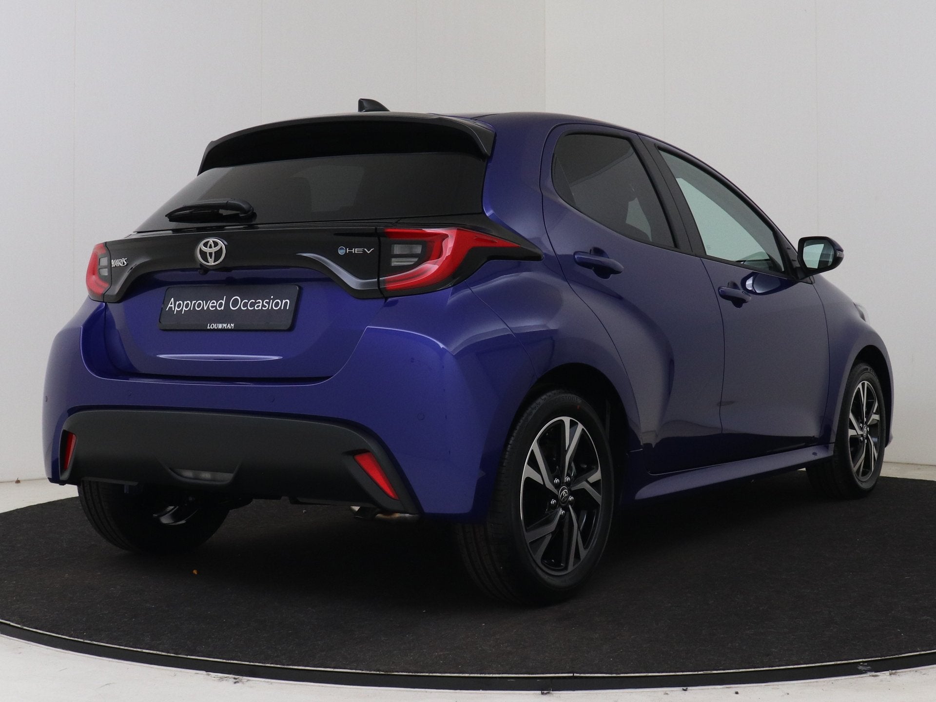 Toyota Yaris 1.5 Hybrid 115 Dynamic (bj 2025, automaat), Auto's, 12 maanden, Automatische klimaatregeling, Blauw, Bedrijf