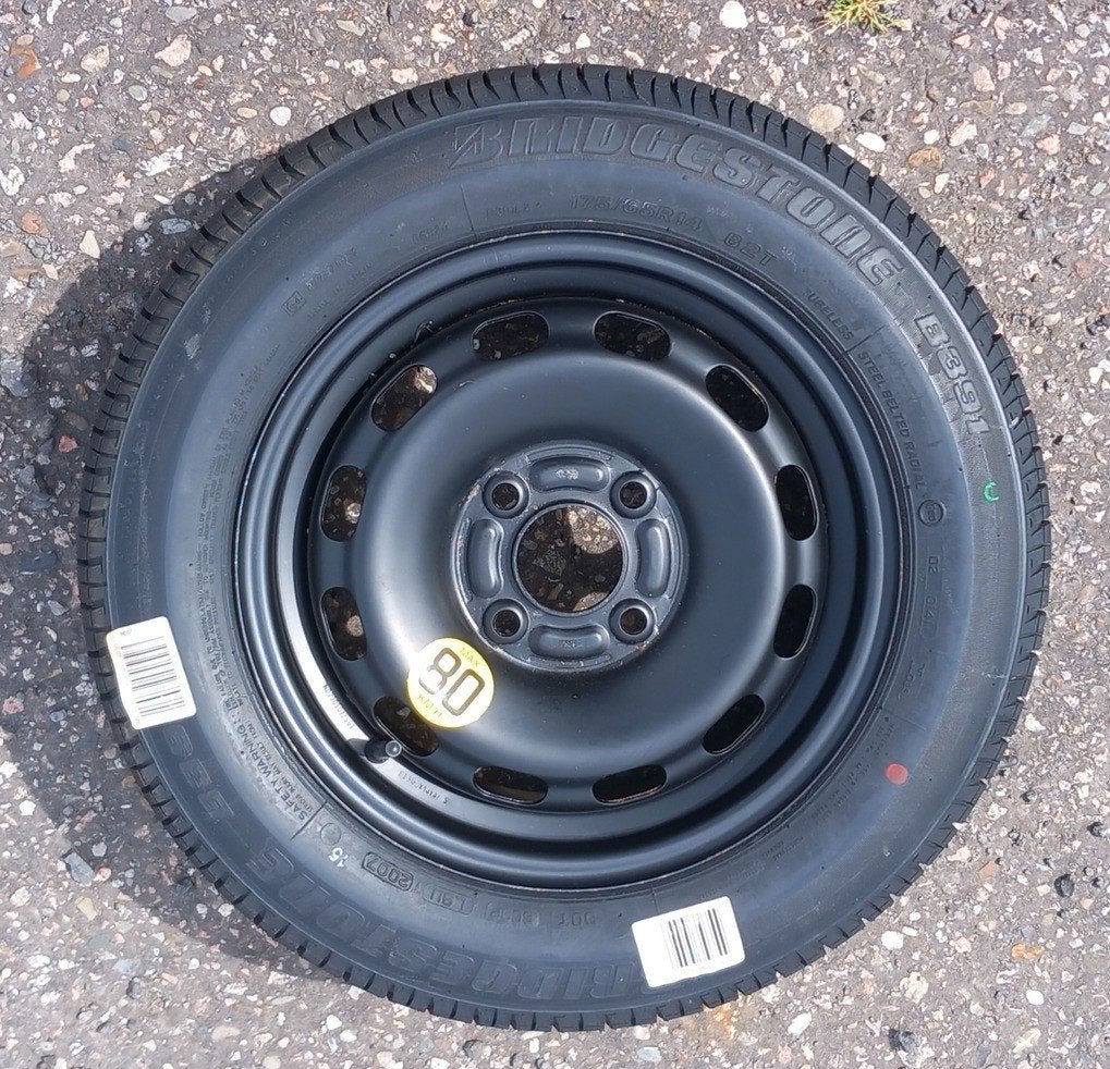 reservewiel thuiskomertje 14 inch, Ophalen