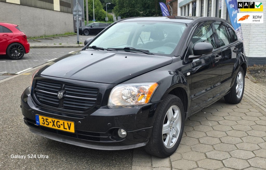 Dodge Caliber 2.0 SXT*automaat*lage km 101000 nap*apk*airco*, Auto's, Dodge, 1998 cc, 450 kg, Gebruikt, Zwart
