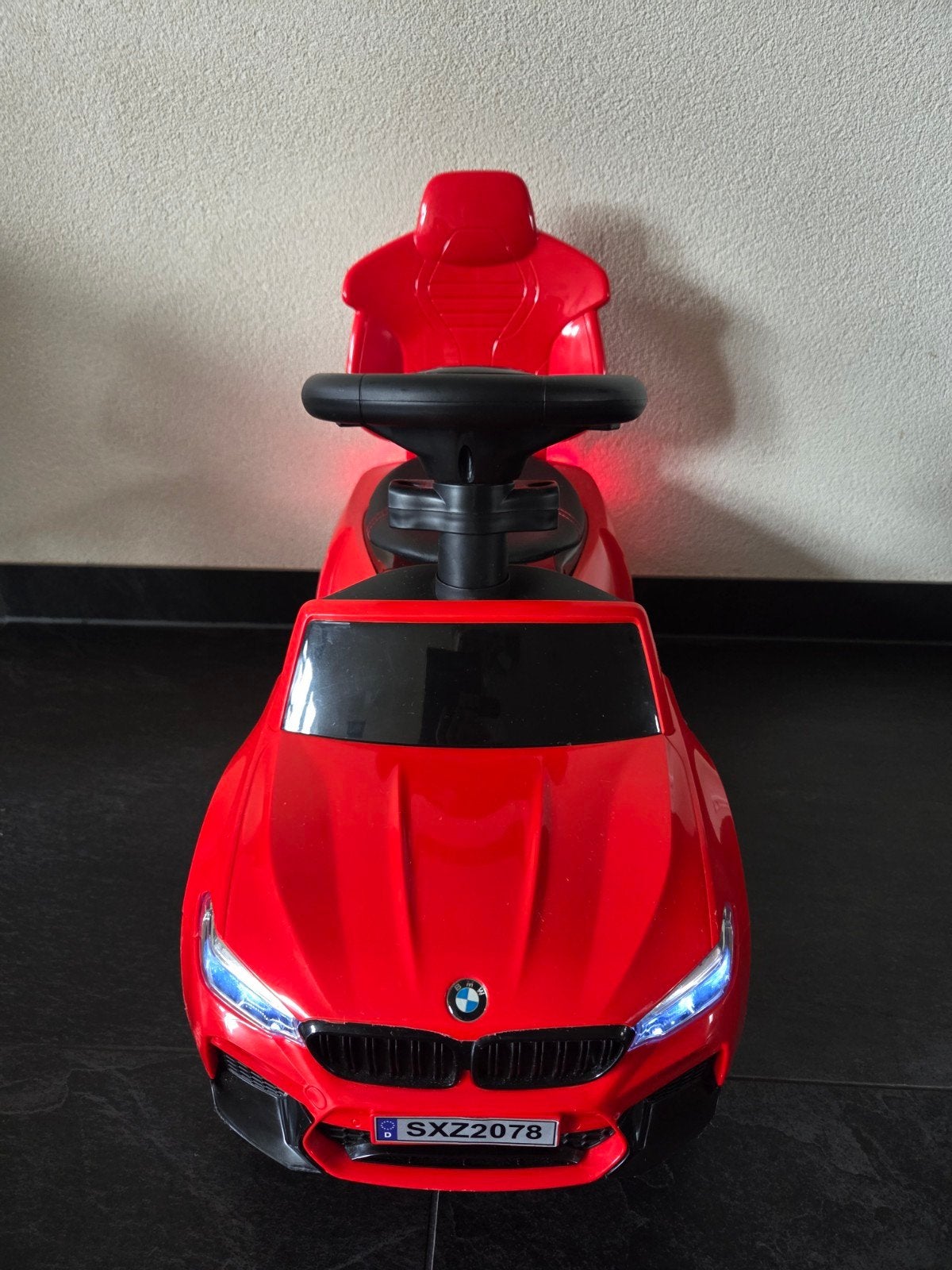 Loopauto bmw, Ophalen