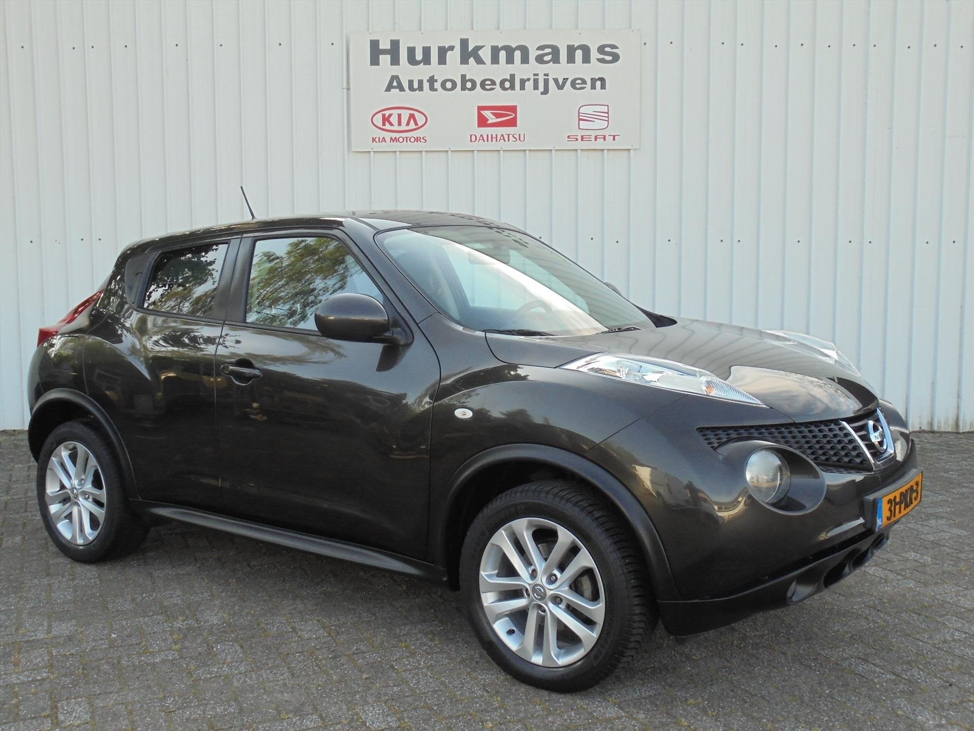 Nissan Juke 1.6 TEKNA 1e EIGENAAR ! NAVI CAMERA ENZ, Auto's, Nissan, Euro 5, Stof, Zwart, 4 cilinders
