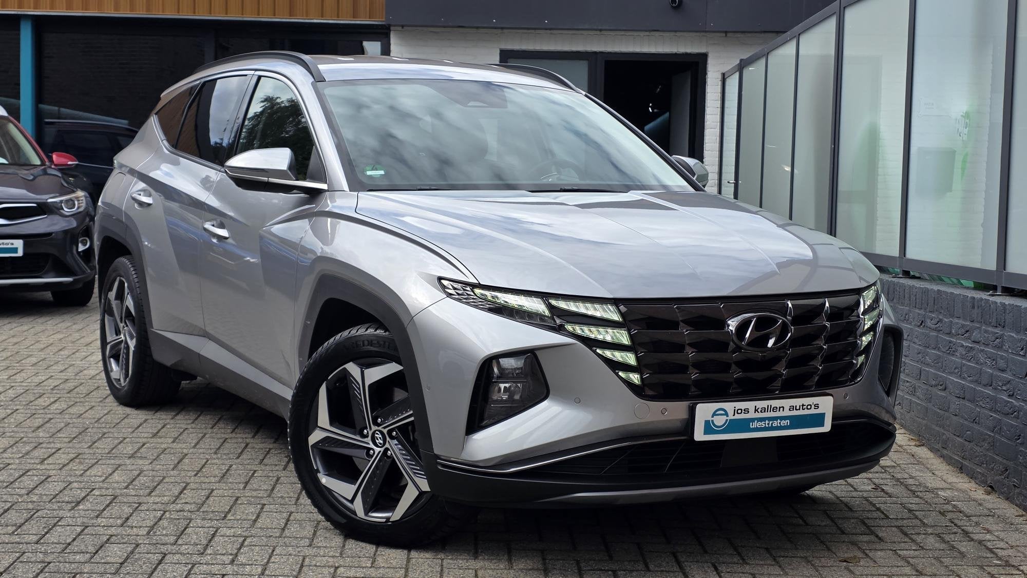 Hyundai Tucson 1.6 T-GDI PHEV Premium 4WD 265pk Navi, Cam 36, Auto's, Automaat, 1350 kg, 14 kWh, Gebruikt