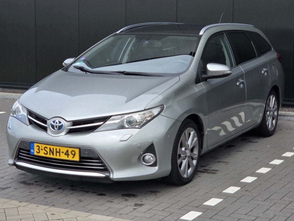 Toyota Auris Touring Sports 1.8 Hybrid Lease Pro, Euro 5, Gebruikt, Leder en Stof, Origineel Nederlands