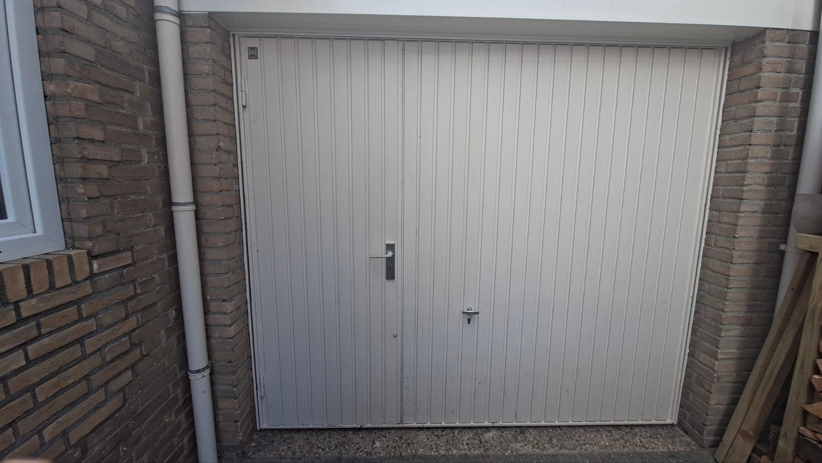 Gebruikte Garagedeur - Bruin Metaal, Doe-het-zelf en Verbouw, Ophalen, Gebruikt, 120 cm of meer, Garagedeur