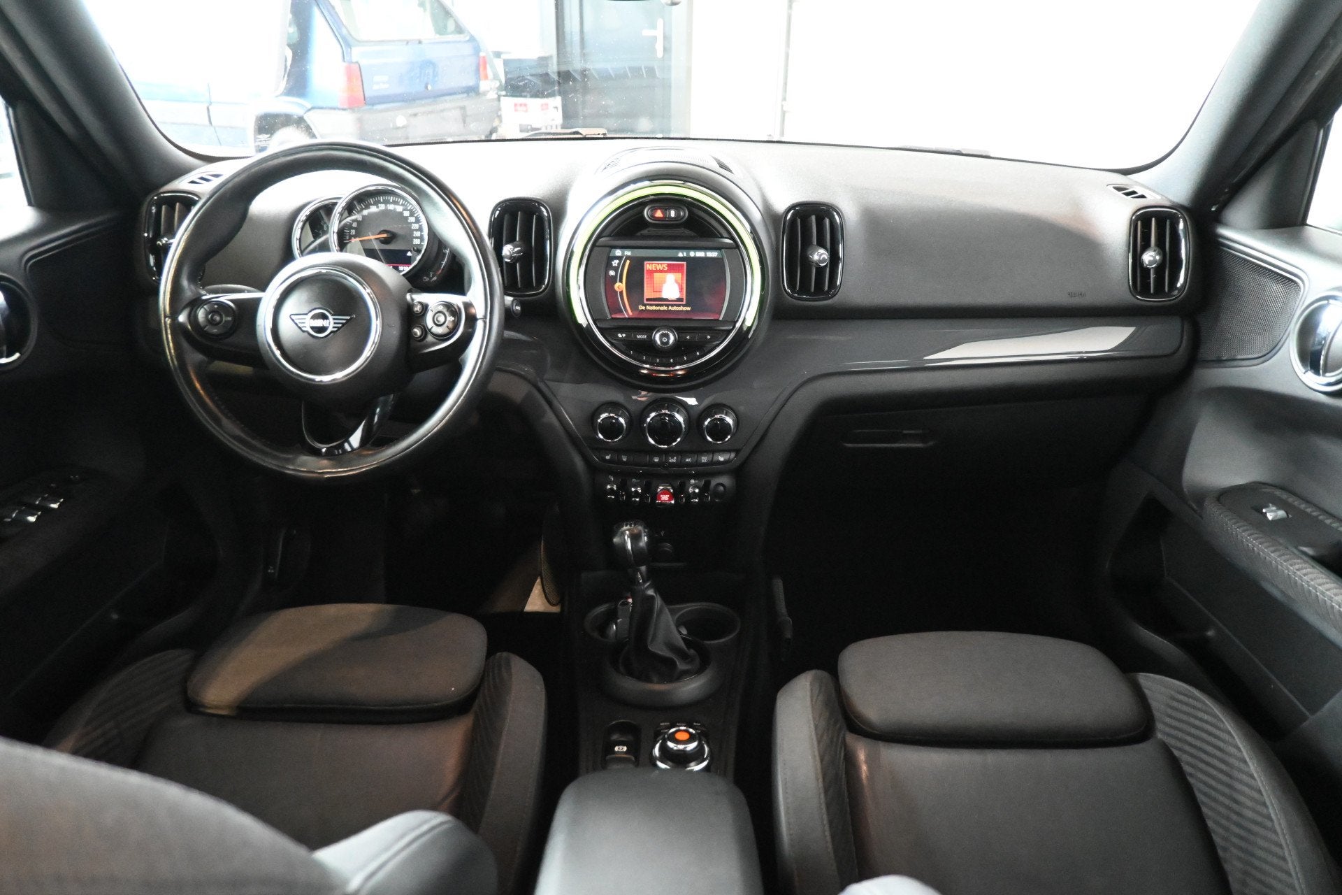 MINI Countryman 1.5 Cooper Dutch Made Edition Clima Cruise c, Auto's, 136 pk, Countryman, Leder en Stof, Zwart