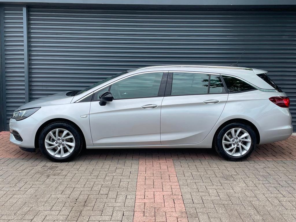 Opel Astra Sports Tourer 1.2 Business Elegance Lane Ass | Ca, Auto's, Opel, Voorwielaandrijving, Stof, Gebruikt, Euro 6