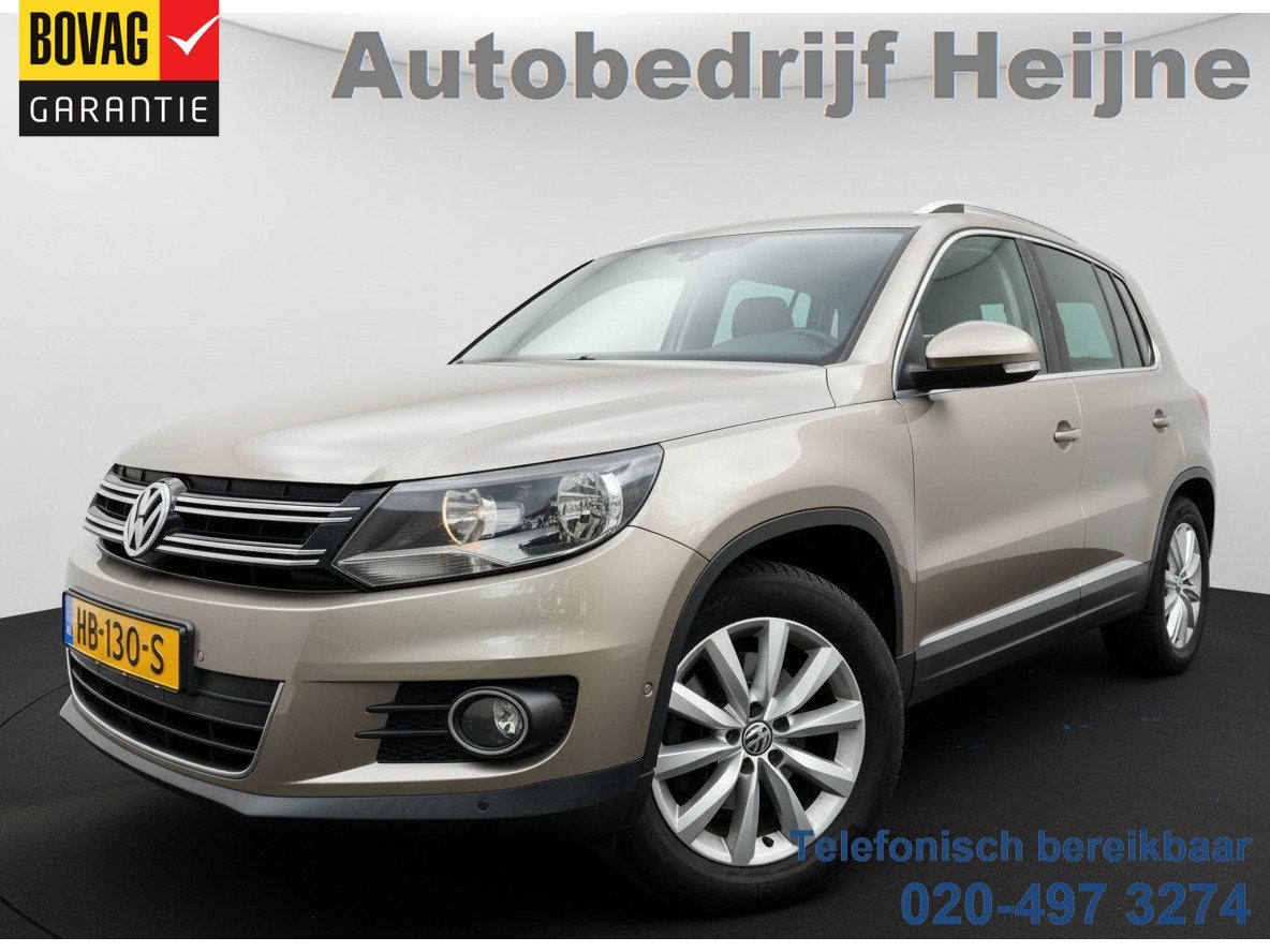 Volkswagen Tiguan 1.4 TSI SPORT&STYLE TREKHAAK/PDC/NAVIGATIE, 15 km/l, Gebruikt, Zwart, 4 cilinders