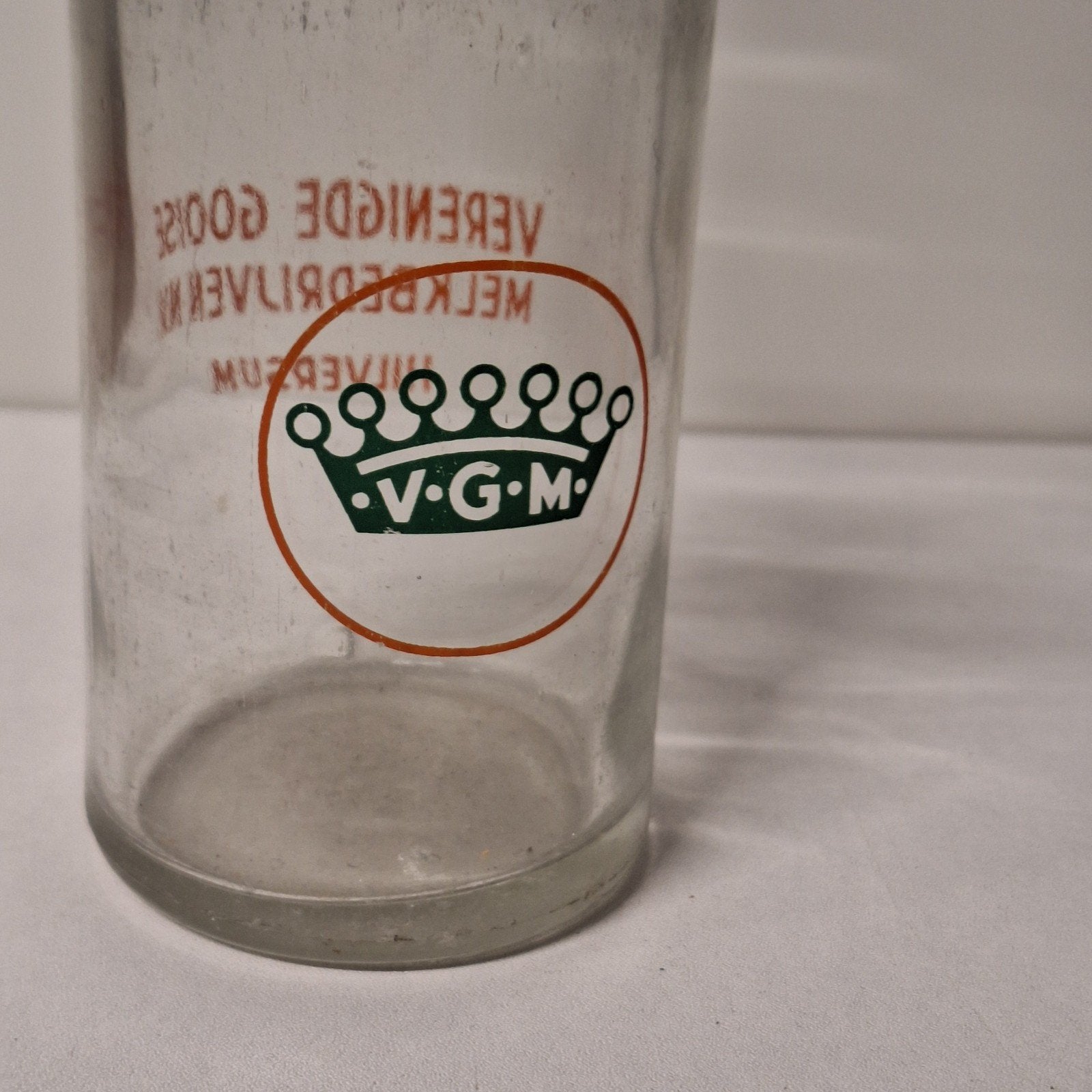 Vintage halve liter melkfles Verenigde Gooise Melkbedrijven, Verzenden