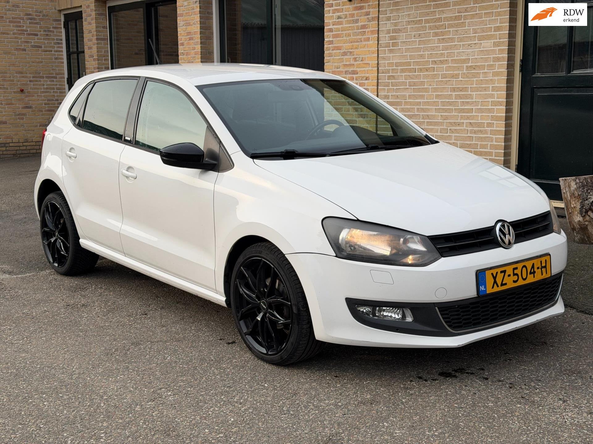 Volkswagen Polo 1.2-12V Style | NAVI | STOELVERWARMING, Voorwielaandrijving, Euro 5, Zwart, 1198 cc