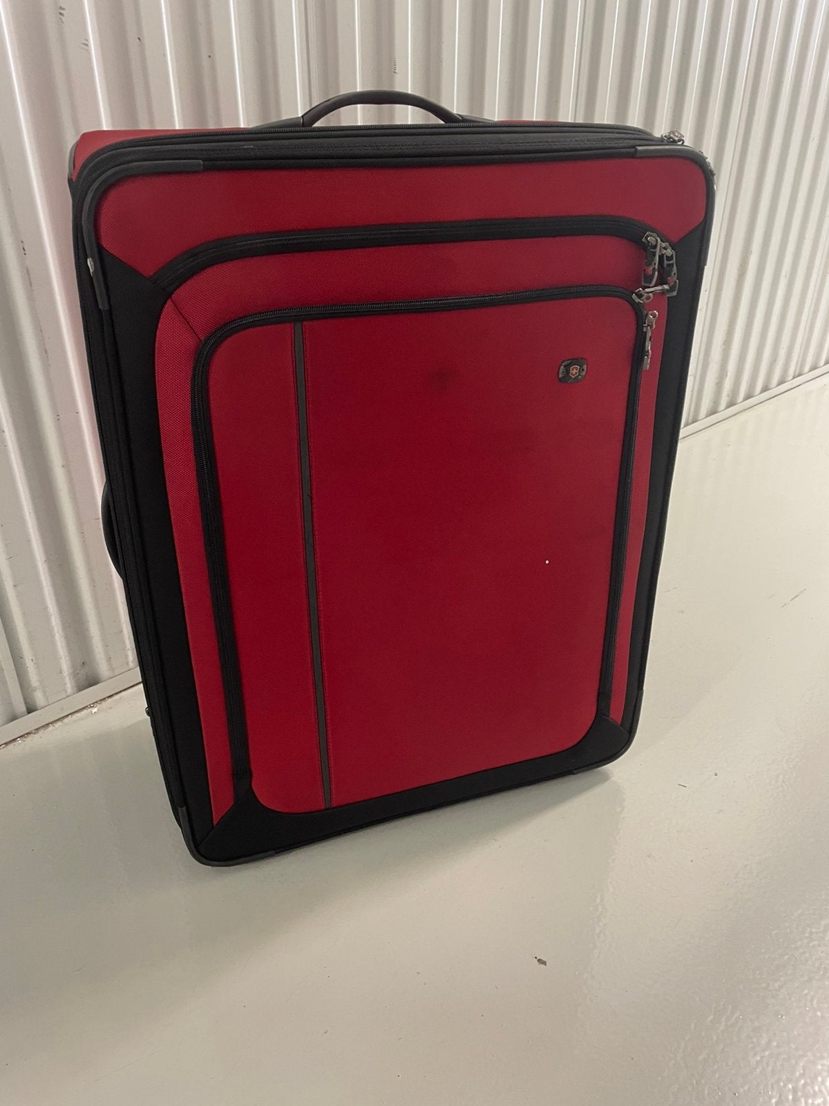 Victroinox. Koffer 70 X 53. X 28, Ophalen, Uitschuifbare handgreep, Gebruikt, Hard kunststof