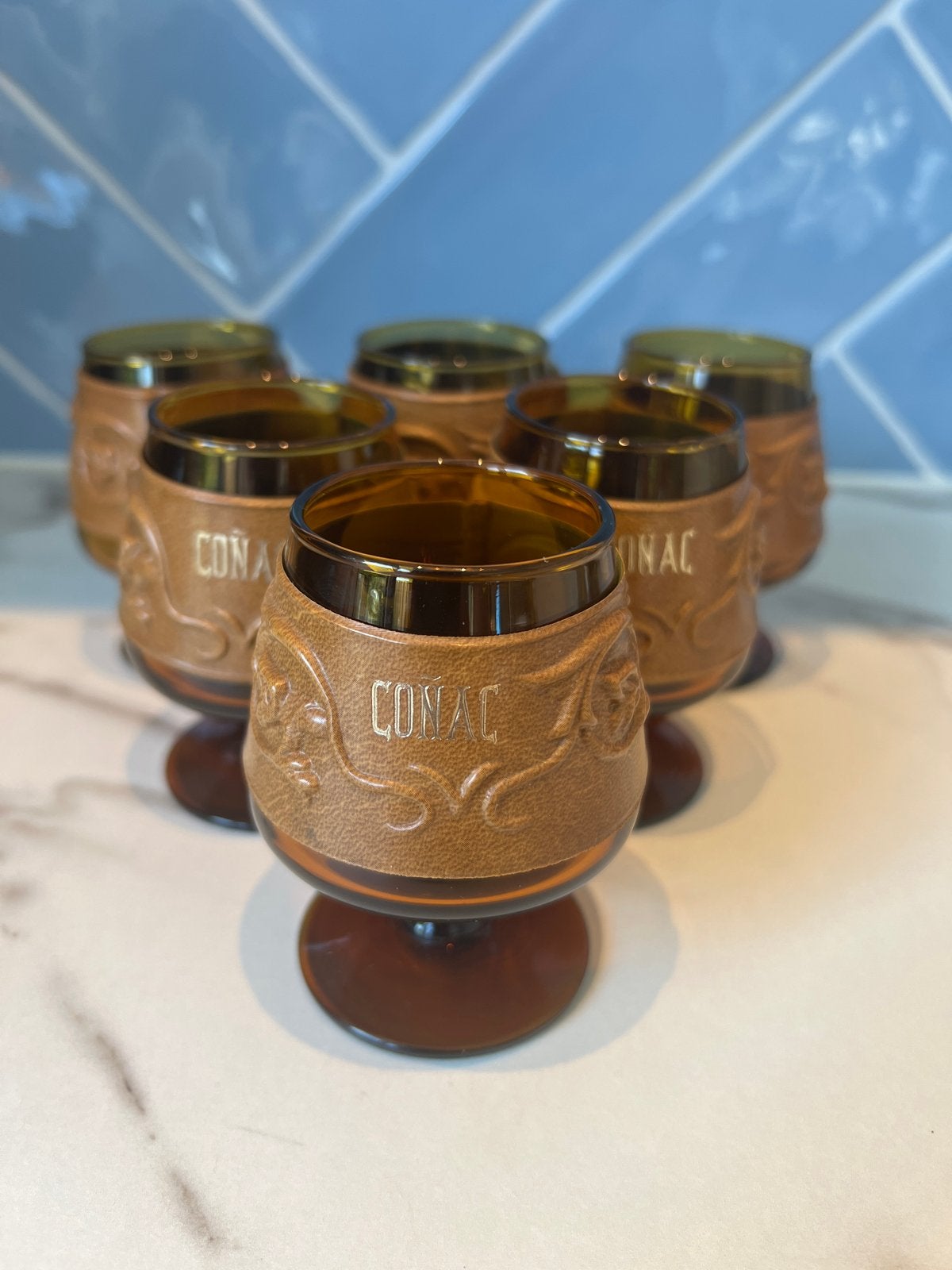 Set van 6 vintage cognac glazen met leren omhulsel, Ophalen