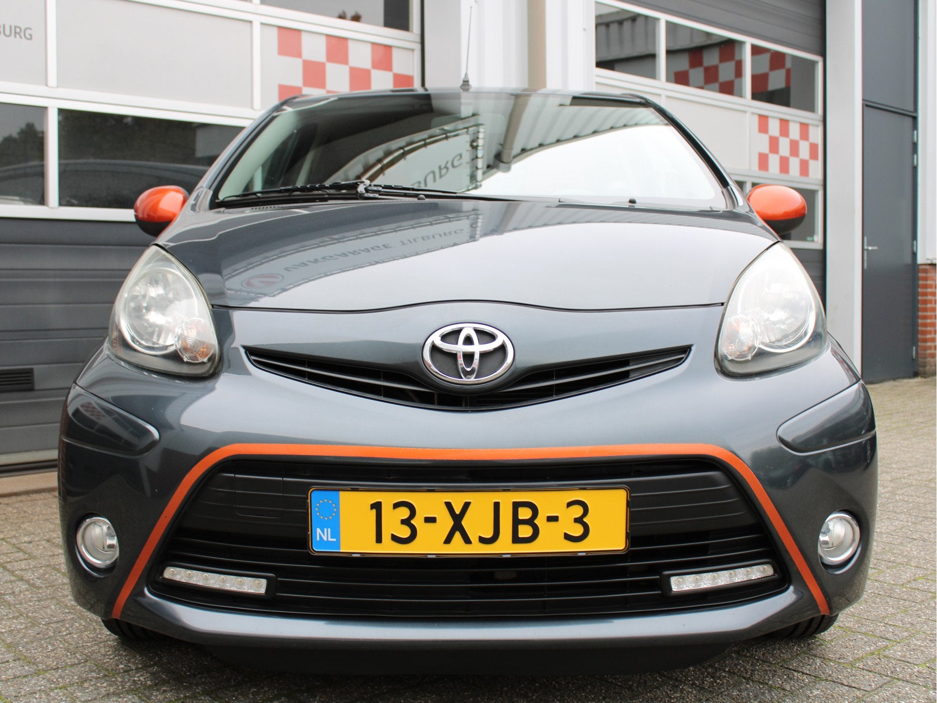 Toyota Aygo 1.0 VVT-i Dynamic Orange /AIRCO/Bluetooth/14'LM/, Euro 5, Gebruikt, 4 stoelen, Origineel Nederlands