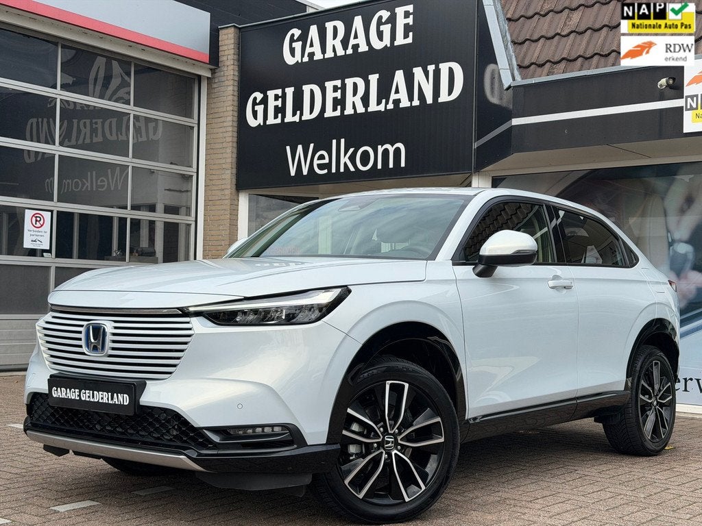 Honda HR-V 1.5 e:HEV Elegance | Parelmoer | Full-Led | Apple, Auto's, Honda, 1380 kg, Zwart, Leder en Stof, Wit