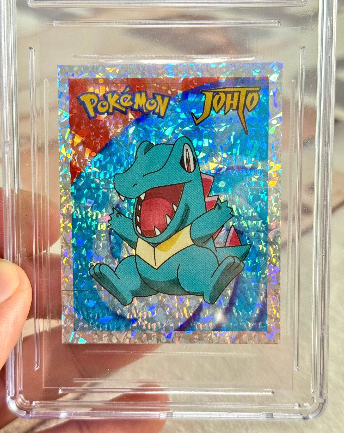 Grade-10 Totodile Merlin Pokemon Stickers 2001 Series 3-43, Ophalen of Verzenden, Nieuw, Losse kaart, Foil