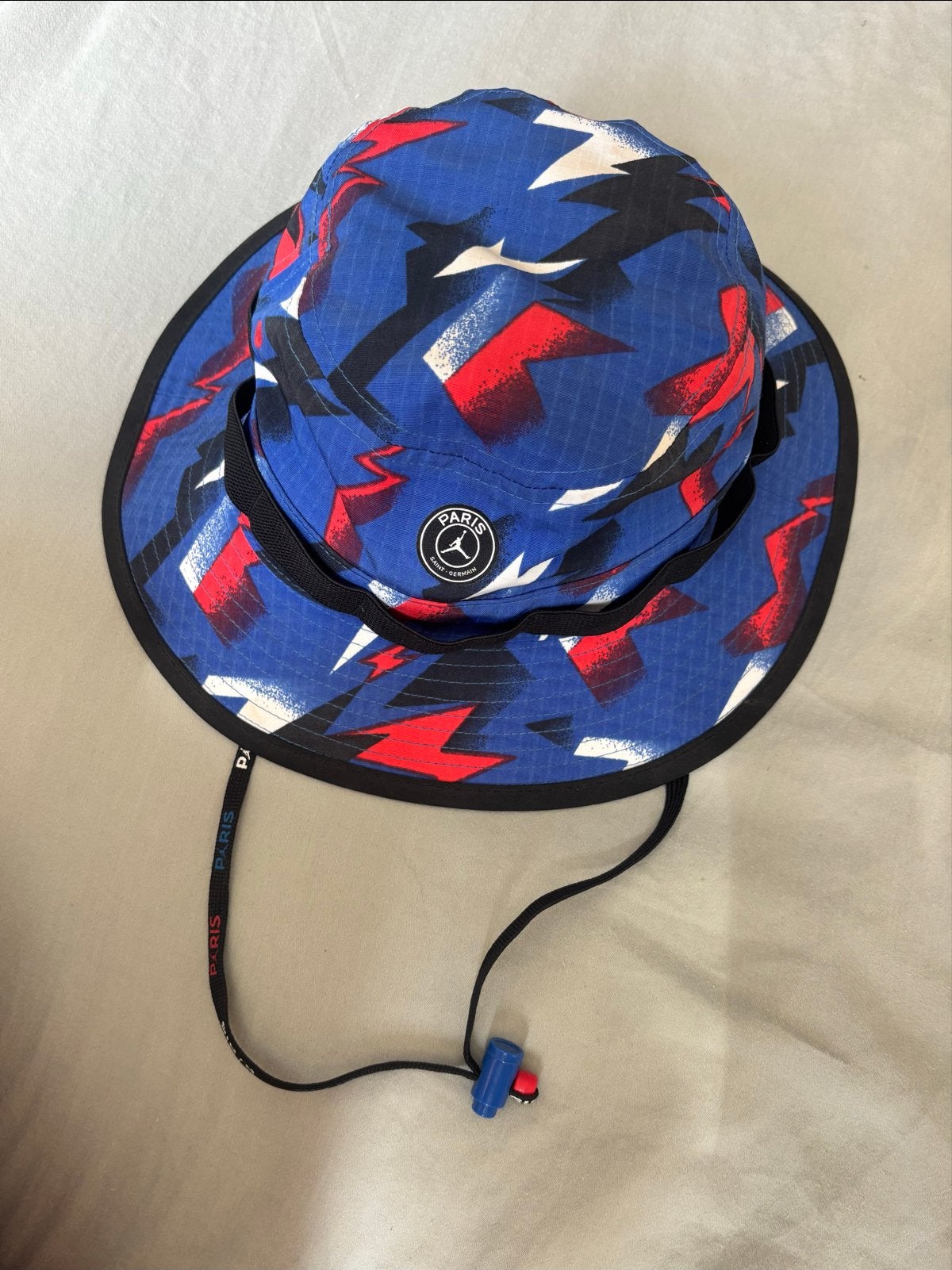 Nike Jordan x PSG Bucket Hat - Hyper Cobalt Limited Edition, Kleding | Heren, Hoeden en Petten, Ophalen of Verzenden, Zo goed als nieuw