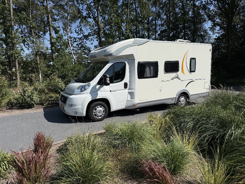 Benimar Mileo 235 2.3 MultiJet | 65.591 km | Airco | Trekh., Caravans en Kamperen, Campers, Achteruitrijcamera, Chemisch toilet