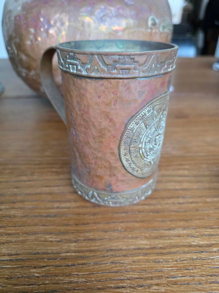 Koperen drinkbeker met Azteekse kalender reliëf, Ophalen of Verzenden