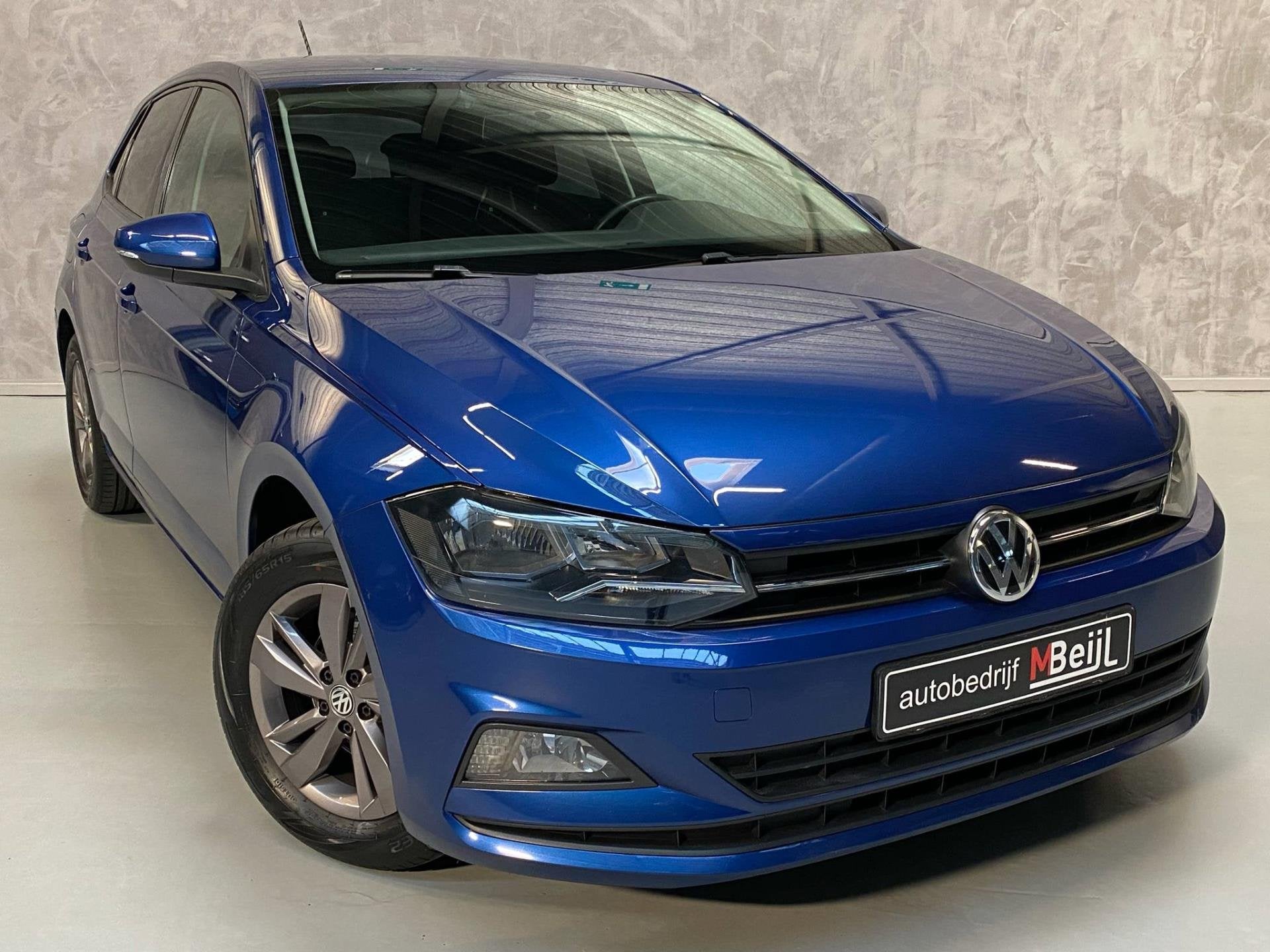 Volkswagen Polo 1.0 TSI Comfortline /Carplay /Cruise /Navi, Auto's, Voorwielaandrijving, Euro 6, Blauw, 23 km/l