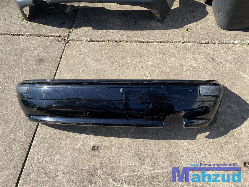 NISSAN MICRA 2 K11 Zwart achterbumper 1992-2002, Takashima 1-chome 1-1
220-8686  Yokohama, Ophalen of Verzenden, Achter, Bumper
